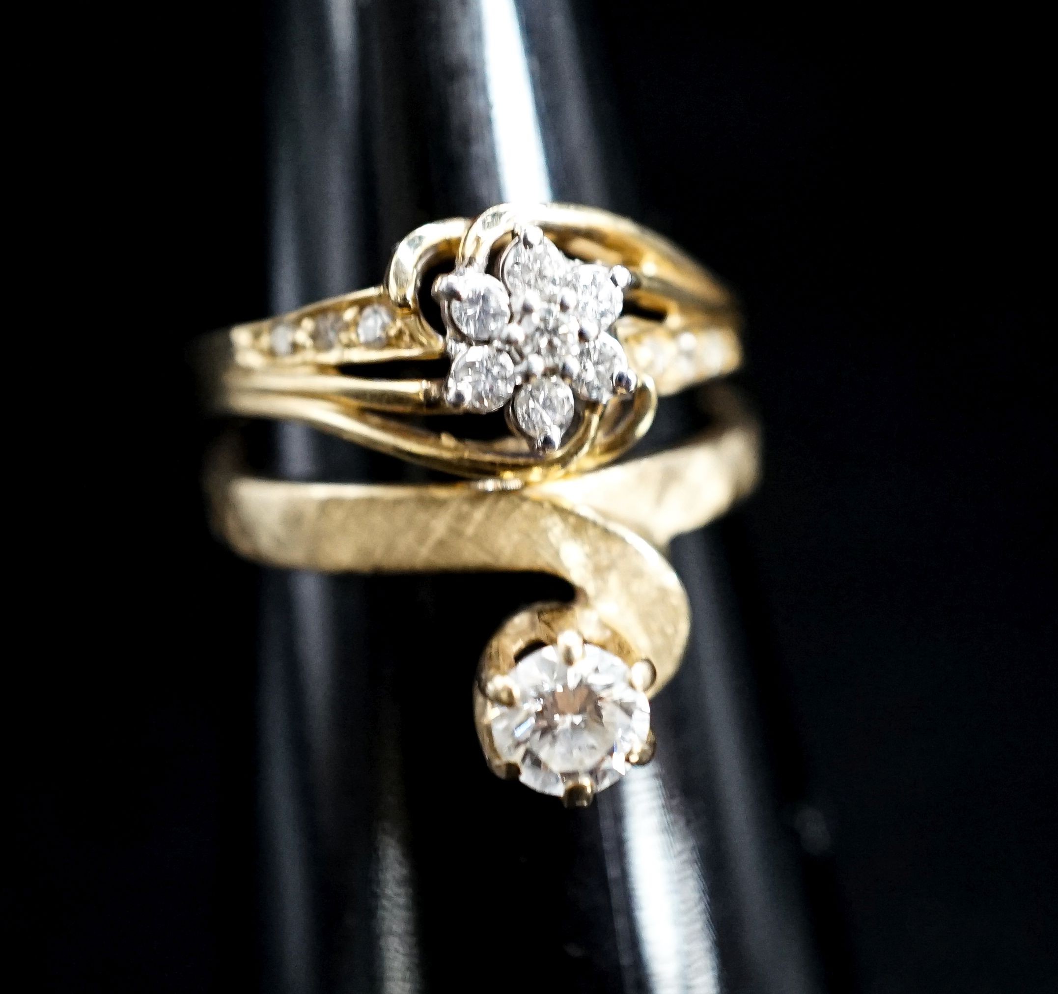 A modern 14k and solitaire diamond ring, size O/P and one other 14k and diamond cluster ring, gross 6.1 grams.